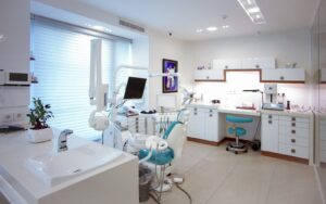Calm, modern dental office with treatment chair and equipment