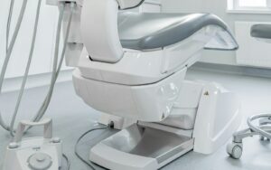 Bright dental treatment room where denture fittings take place