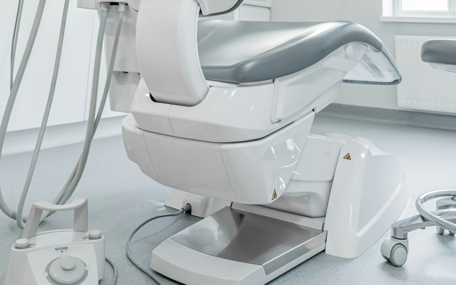 Bright dental treatment room where denture fittings take place