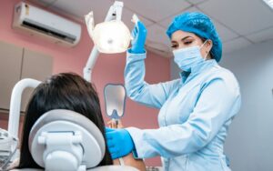 Woman having her teeth checked by a dentist for wisdom teeth